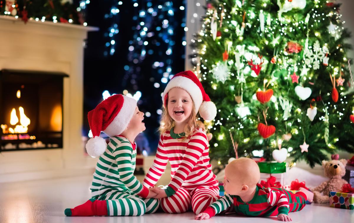 Božič, otroci, darila | Foto Thinkstock