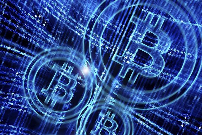 Vse kaže, da so virtualne valute in bitcoin kot njihov najbolj prepoznaven predstavnik prvi korak k decentralizaciji finančnih storitev in celotnega gospodarstva.  | Foto: Reuters