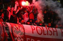 Uefa bo kaznovala Poljake zaradi metanja bakel