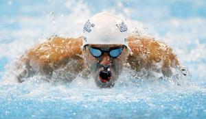 Phelps na rojstni dan plaval dva najboljša izida sezone