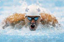 Phelps na rojstni dan plaval dva najboljša izida sezone
